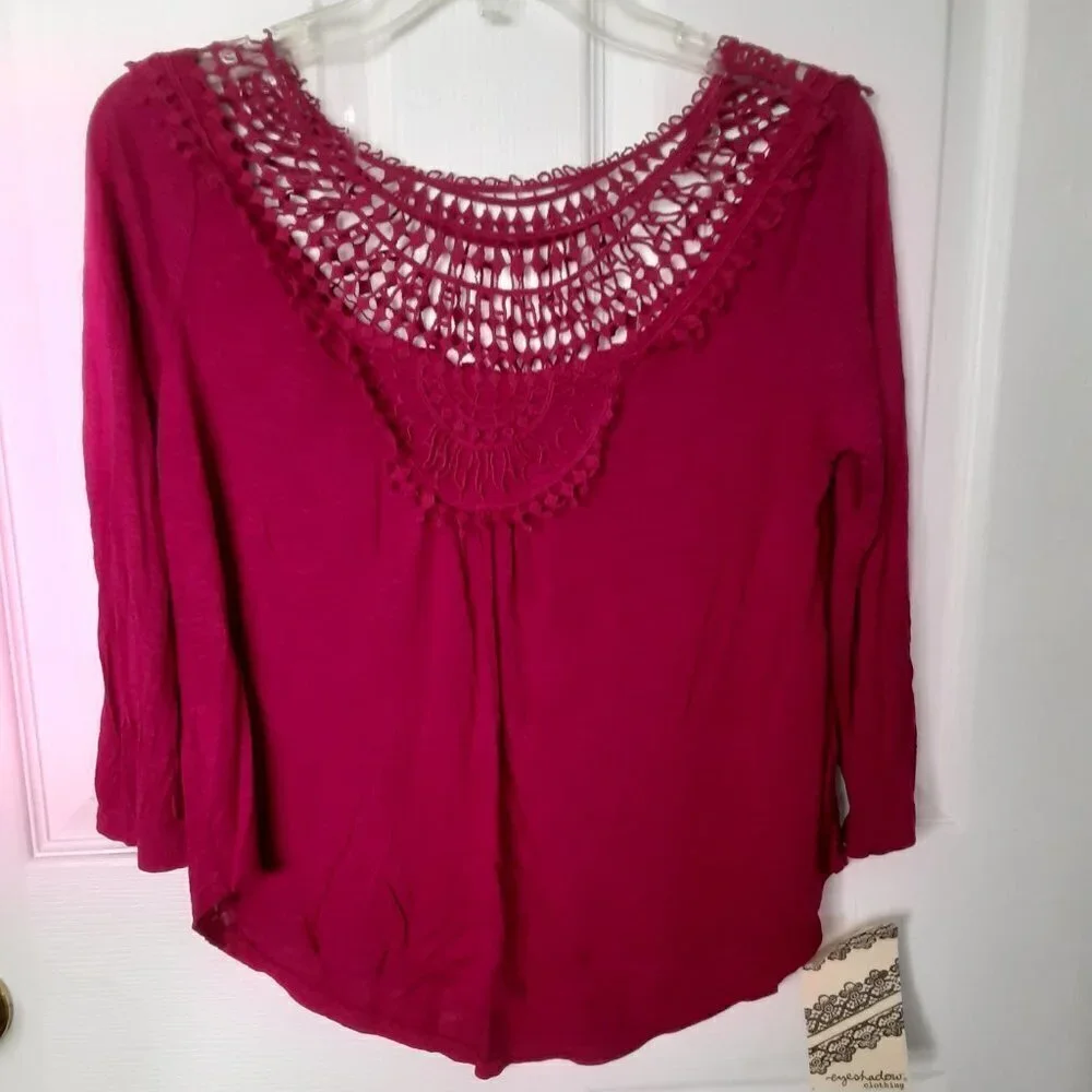 Eyeshadow Size Small Red Top w/3/4 Length Sleeves. Embroidered on Top.